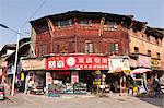 China, Yunnan, Kunming. A glimpse of old 'wooden' Kunming, much of it now gone.