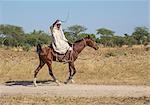 Chad, Kanem, Bahr el Ghazal, Sahel. An old Kanembu man riding home on his horse near the Bahr el Ghazal.