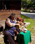 Czech Republic, North Moravia, Zlin, Roznov pod Radhostem, Wallachian Town. A craftsman building a barrel