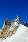 Europe, France, French Alps, Haute-Savoie, Chamonix, Aiguille du Midi, skiers starting Vallee Blanche off piste