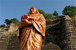 India, Madhya Pradesh, Maheshwar. At the foot of Ahilya Fort beside the Narmada River, a statue comemorates the life of Ahilya Bai Holkar.