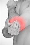 Man touching highlighted elbow pain