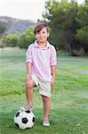 Portrait of boy with football