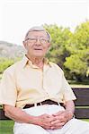 Portrait of elderly man in the park