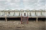 WOODEN CABINS ON THE BEACH IN WINTER, OSTIA LIDO, ROME, ITALY