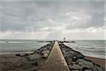 A PIER ON THE SEA IN WINTER ON A CLOUDY DAY, OSTIA LIDO, ROME, LAZIO, ITALY