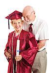Senior man congratulates his successful wife on her college graduation.  Isolated on white.