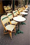 Street view of a coffee terrace with tables and chairs,paris France