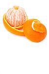 Orange surrounded by an orange peel against white background