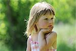 very beautiful little girl on nature