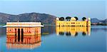 The palace Jal Mahal at night.  Jal Mahal (Water Palace) was built during the 18th century in the middle of Mansarovar Lake.  Jaipur, Rajasthan, India, Asia. Panorama.