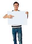 Portrait of young man pointing at blank signboard. Isolated on white