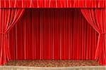 stage with open red curtain