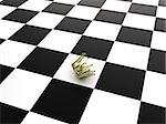 Beautiful gold crown lies on a chessboard