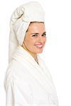 Portrait of smiling young woman in bathrobe