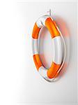 An image of an orange white life saver at the wall