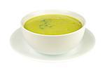Asparagus soup in a bowl isolated on a white background