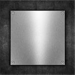 Grunge metal background with shiny metal plate