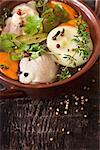 Traditional homemade chicken bouillon with vegetables and spices.