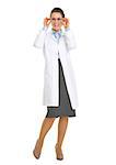 Full length portrait of smiling oculist doctor woman in eyeglasses