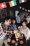 Young people having a drink in a bar