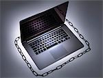 Chain around laptop computer