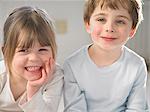 Children smiling together indoors