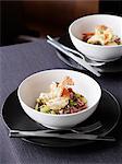 Bowls of prawns, broadbeans and rice