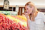 Woman shopping in grocery store