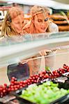 Mother and daughter in grocery store