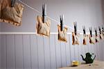 Teabags hanging from clothesline