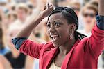 Excited woman in crowd