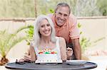 Older couple celebrating birthday