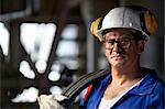 Industrial worker with wires in plant