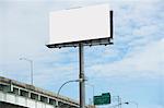Blank billboard over freeway