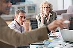 Businessman drawing graph in meeting