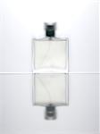 Blurred view of perfume bottle