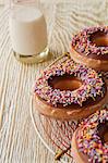 Decorated doughnuts and milk