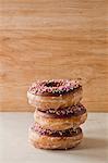 Stack of decorated doughnuts