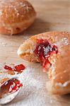 Jam doughnut on table