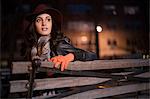 Woman sitting on park bench