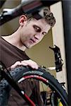 Mechanic working in bicycle repair shop
