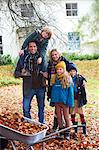 Family smiling together outdoors