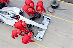 Racing team working at pit stop