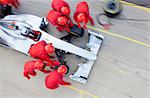 Racing team working at pit stop