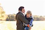 Father and son playing outdoors