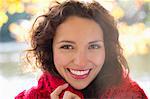 Smiling woman standing in park