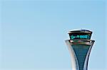 Air traffic control tower and blue sky