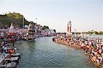 Crowd and a clock tower at Malviya Dwipa (island), River Ganges, Haridwar, Uttarakhand, India