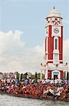 Crowd on ghat in front of a clock tower at River Ganges, Malviya Dwipa, Haridwar, Uttarakhand, India